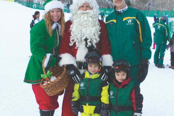Santa visits Deer Valley Resort on Christmas Eve Day. Snow Park area.