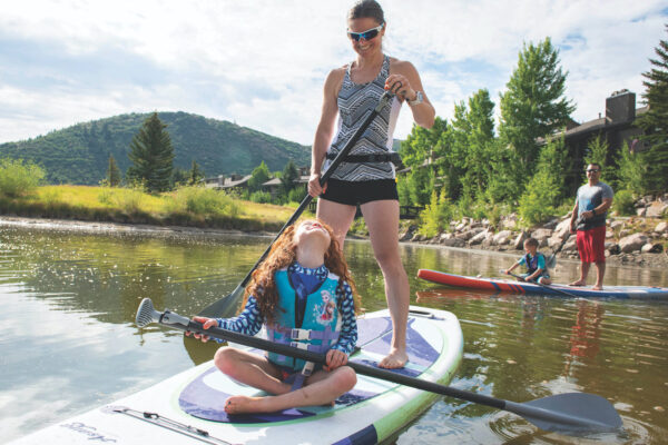 Mother and Daughter on Stand Up Paddle Board 2